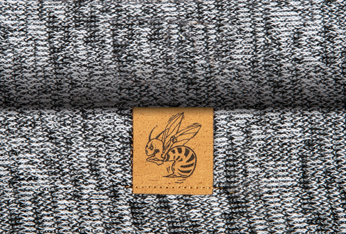 Custom applique screen print on suede clip label