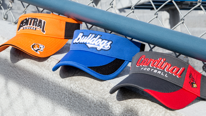 Visors sitting in grandstands