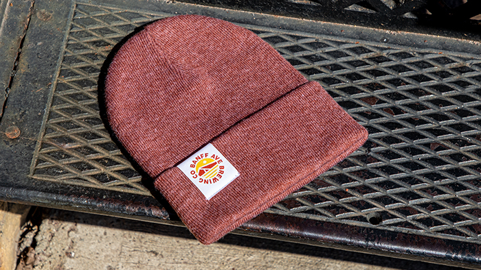 Rouster Knit laying on a metal step