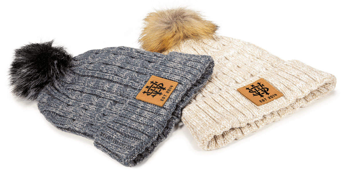 Wineries & Distilleries Cable Knits featuring cuffed silhouette and faux fur poms